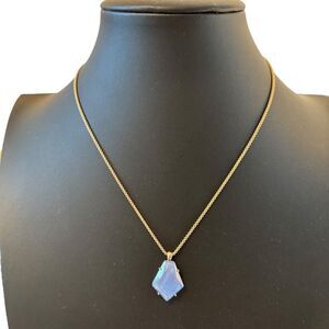 Beautiful Light Blue Iridescent Pendant on Gold Tone Chain.